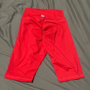 Red slightly longer than biker length muscle nation shorts size small